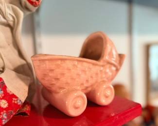 Vintage pink pottery baby carriage planter