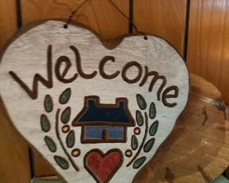 Wooden heart-shaped Welcome hanging sign