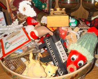 Wooden bowl of small toys and collectibles