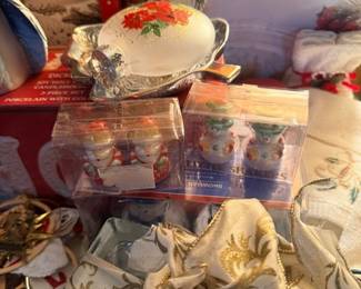 Porcelain china piece and embroidered linens