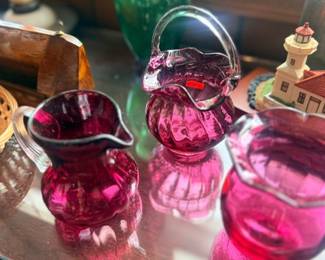 Cranberry glass pitchers & baskets