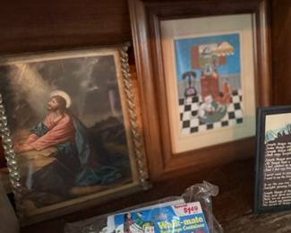Framed religious art print in wood frame