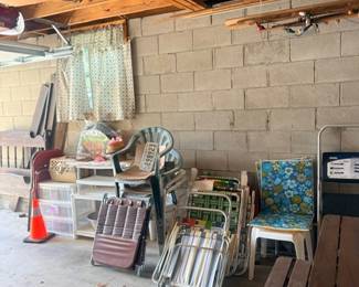 Folding lawn chairs and wooden bench