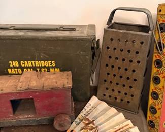 Vintage folding hand fan, metal ammo can & cheese grater