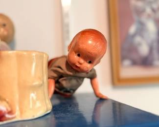 Vintage Kewpie-style figurine & ceramic planter