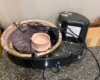 Pottery wheel and ceramic bowls