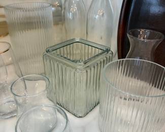 Ribbed glass vases and votive holders