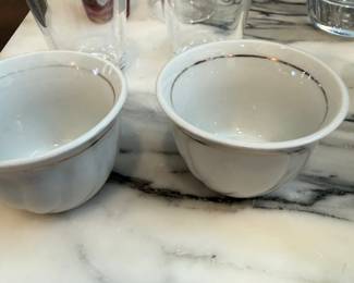 White bowls with silver rim