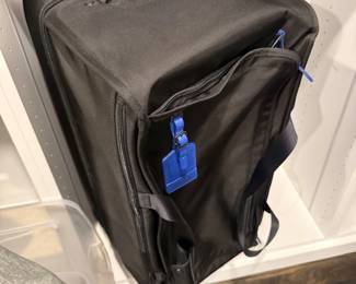 Black rolling suitcase