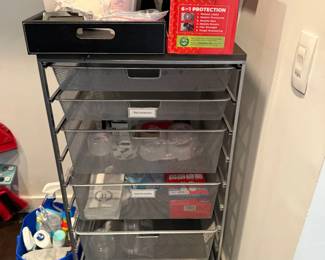 Rolling storage cart with mesh drawers