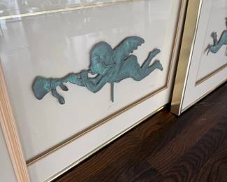 Framed verdigris angel with horn wall art