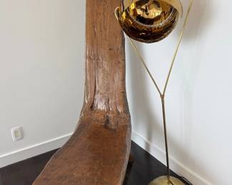 Primitive carved wood mortar and brass floor lamp
