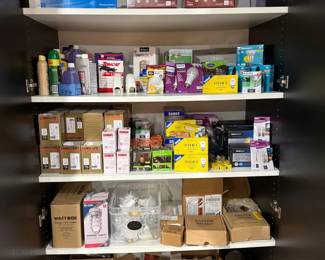 Shelves of light bulbs and hardware supplies