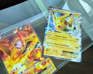 Charizard EX and Pikachu EX oversized promo cards