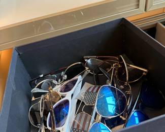 Box of assorted designer sunglasses