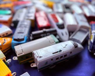 Assorted toy train cars