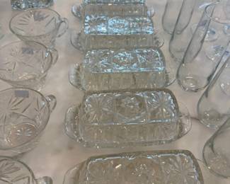 Pressed glass relish trays and creamers
