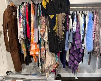 Designer dresses and blouses on rack