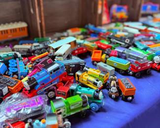 Loose toy trains and die-cast vehicles