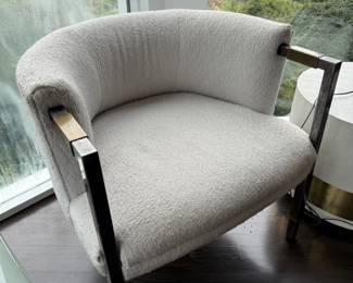 Cream boucle barrel-back armchair, metal frame