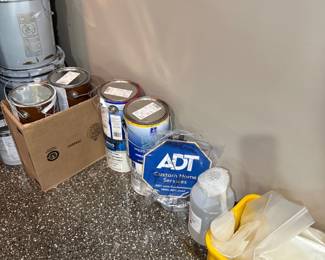 Paint cans and painting supplies