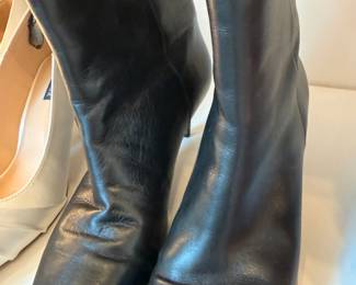 Black leather knee-high boots