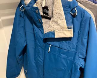 Blue insulated ski jacket with fleece lining