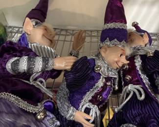 Purple velvet elf and jester figures