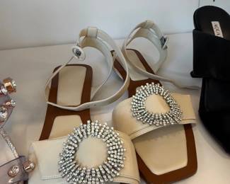Crystal buckle cream sandals and designer mules