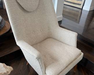 Cream boucle high-back wing chair