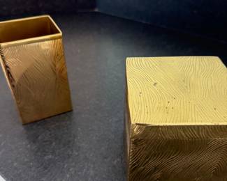 Gold wastebasket and gilt cube stool