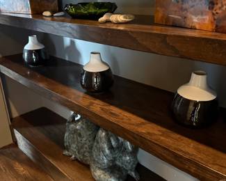 Floating wood shelves with studio pottery