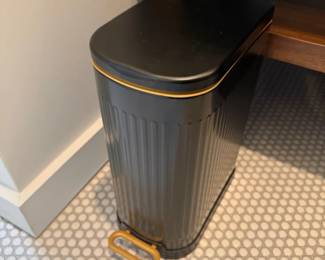 Black and gold step trash can