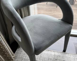 Gray velvet sculptural armchair