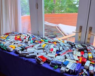 Large toy train and die-cast vehicle collection