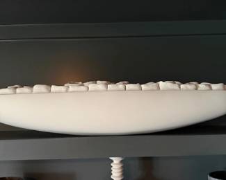 White ceramic bowl with decorative stones