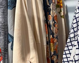 Cream draped dress and printed blouses