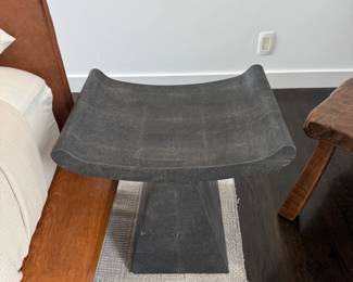 Gray curved seat sculptural stool