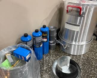 Propane canisters and camp cookware