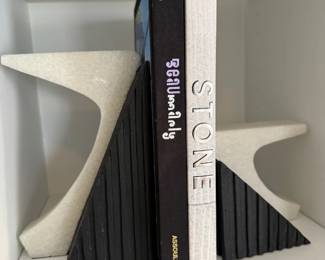 Cast stone bookends with art books