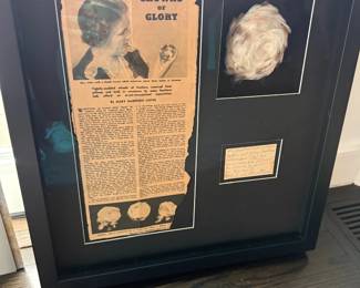 Framed historical shadowbox with newspaper clipping