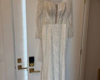 Ivory beaded long sleeve evening gown
