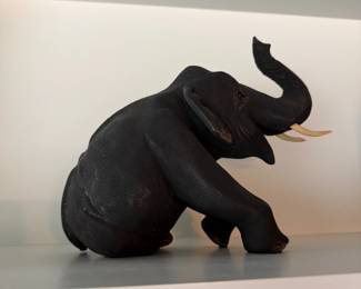 Carved black elephant sculpture