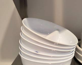 White ceramic serving bowls, stacked
