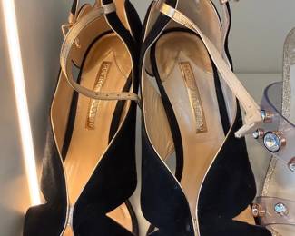 Black suede pointed-toe heels and evening sandals