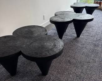 Ebonized wood cluster coffee table with cone legs