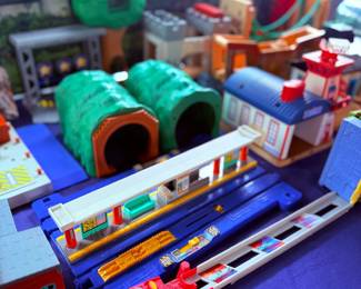 Toy train playset with tunnel and station