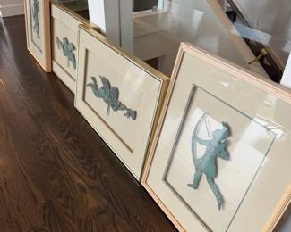 Framed verdigris cherub wall art, pair