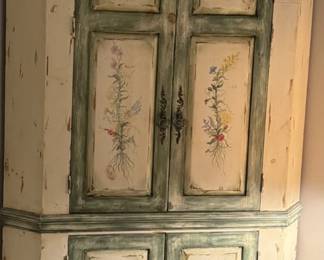 HABERSHAM CORNER CABINET WITH THE DOORS CLOSED.