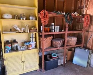 Yellow shelf, picnic baskets, electrical cords, lights
